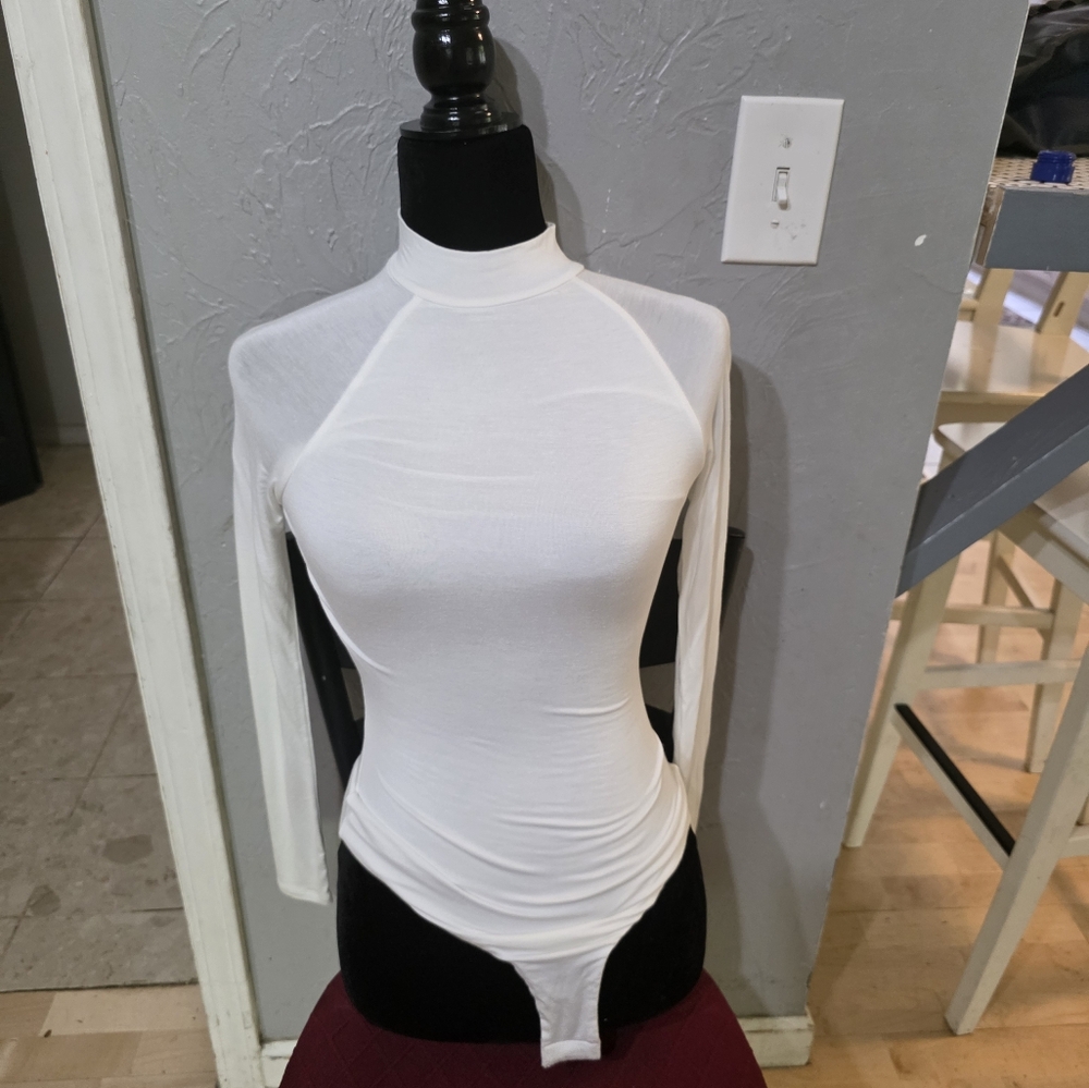 Elegant White Turtleneck Top